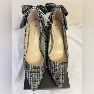 Elegant Black and White Heels with Classic Design